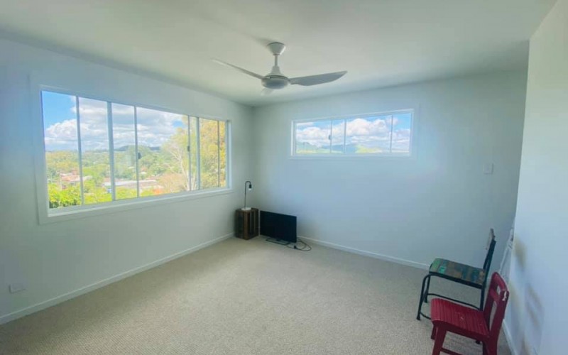 An Upstairs room with a Hinterland View